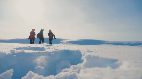 Teamwork. men tourists climbing walking top mountains lifestyle rocks peak group Stock Footage 104528050