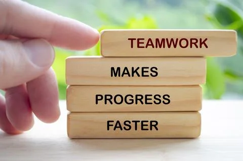 Teamwork motivation concept shown through wooden blocks emphasizing efficie.. Stock Photos