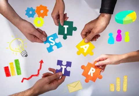 Teamwork of partners. Concept of integration and startup with puzzle pieces Foto stock