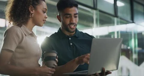 Teamwork, people and developers on laptop in office for help, software update or Stock Photos