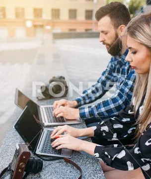 Teamwork photoshoot lifestyle. web surfing concept Stock Photos