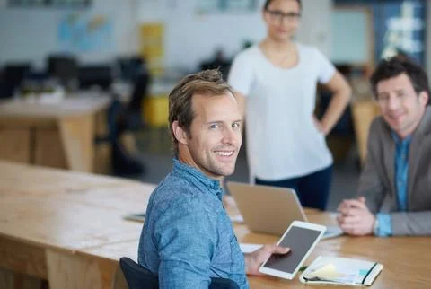 Teamwork, portrait or happy developers in meeting for discussion or Foto stock