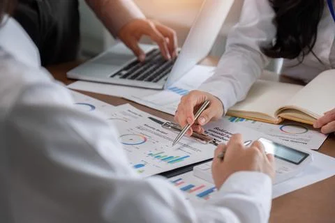 Teamwork process Brainstorming ideas for business planning Document and digital Stock Photos