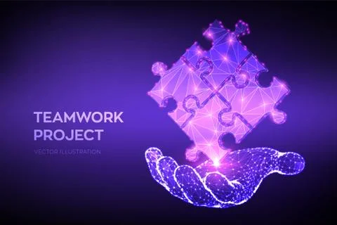 Teamwork. Puzzle elements in hand. Team metaphor. Symbol of teamwork, coopera イラスト素材