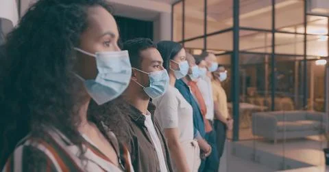 Teamwork is really a form of trust. a team of coworkers in their office during Stock Photos