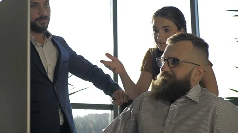 Teamwork. Three young architects working on a project Stock Footage 110934160