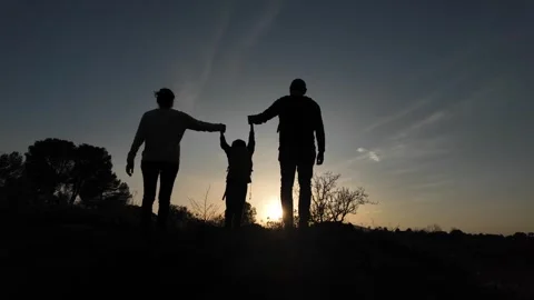 Teamwork Triumphs as Three Brave Souls Conquer the Mountains Video stock 270453052