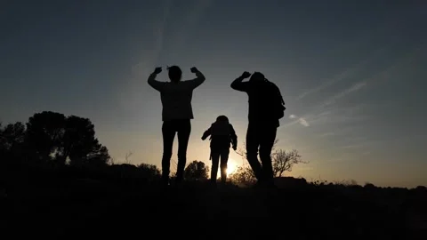 Teamwork Triumphs as Three Brave Souls Conquer the Mountains Video stock 270453054