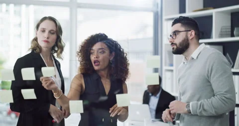 Teamwork, unity and innovation at work. Group of business people working Stock Footage 203987051