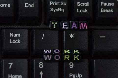 Teamwork word from blocks on keyboard close up. Stock Photos