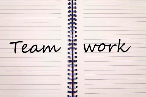 Teamwork write on notebook Stock Photos