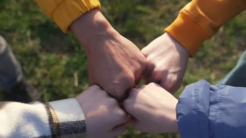 Teamwork.Group of people partners hitting their fists together.Corporate work Stockbeeldmateriaal 246958995