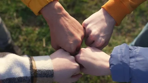 Teamwork.Group of people partners hitting their fists together.Corporate work 스톡 동영상 257875369