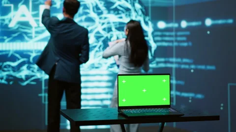 Teamworking AI technicians using green screen laptop for business data analysis Stock Footage 278695725