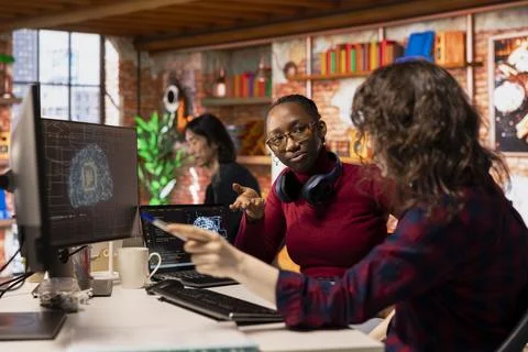 Teamworking artificial intelligence tech venture employees collaborating 스톡 사진