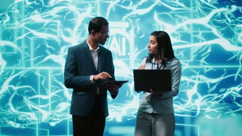 Teamworking colleagues using AI neural networks modeled after human brain Stock Footage 278622357