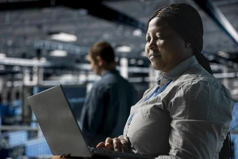 Teamworking data center programmers writing code for resource optimization Stock Photos