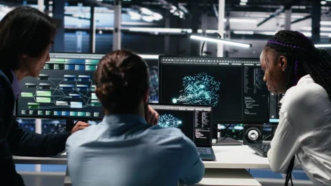 Teamworking data center technicians using machine learning algorithms Stock Footage 313637046