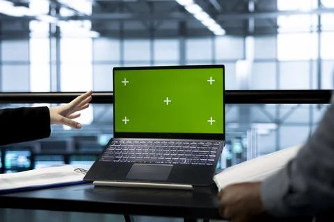 Teamworking technicians in data center using mockup notebook Foto stock