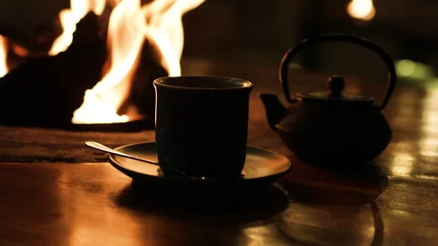 Teapot and cup background fire. Stock Footage 273492553