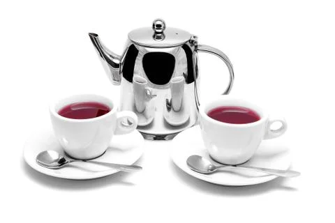 Teapot and two cups of tea on a saucer Stock Photos