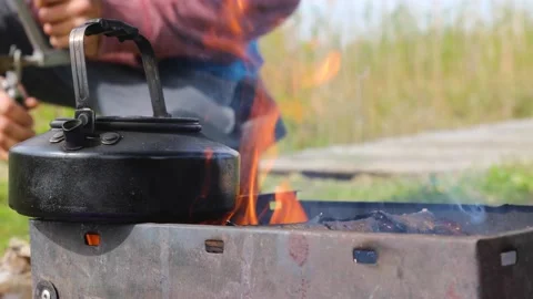 Teapot boiled during camping time. Stock Footage 132382069