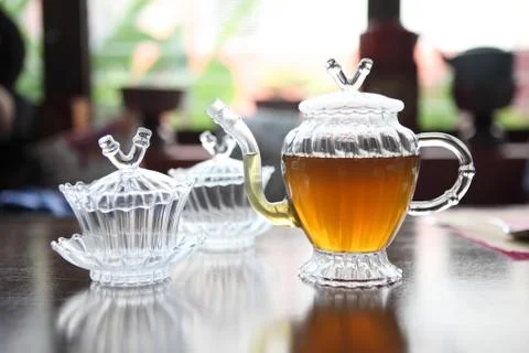 Teapot with cup Stock Photos