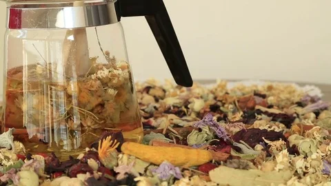 Teapot with different kind of healing herbs 2 Stock-Footage 70403433