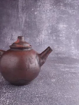Teapot from earthenware (pottery). Stock Photos