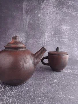 Teapot from earthenware (pottery). Stock Photos