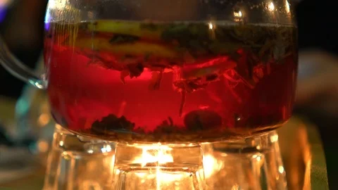 Teapot with fruit tea Stock Footage 104680661