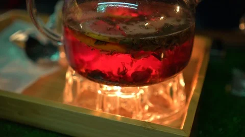 Teapot with fruit tea Stock Footage 104680683