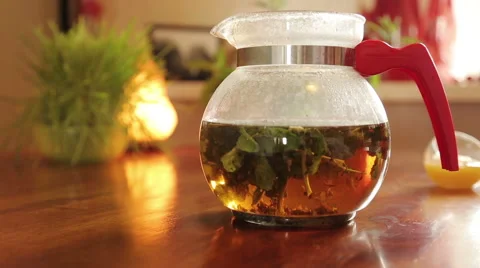 Teapot with healthy tea Stock Footage 50686849