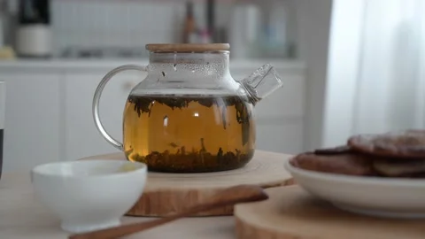 Teapot of herbal tea . Tea time. Blooming sally. 스톡 동영상 187484759