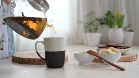 Teapot of herbal tea . Tea time. Blooming sally. Stock Footage 187485864