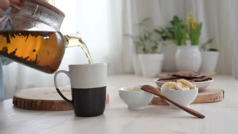 Teapot of herbal tea . Tea time. Blooming sally. Stock Footage 195002266