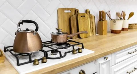 Teapot kitchen stove interior design Stock Photos