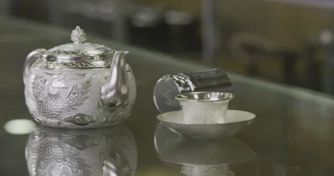 Teapot on table Stock Footage 141363651