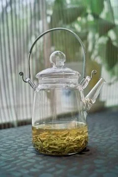 Teapot on table Stock Photos