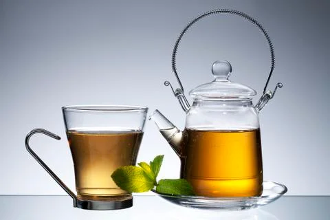Teapot with tea Stock Photos