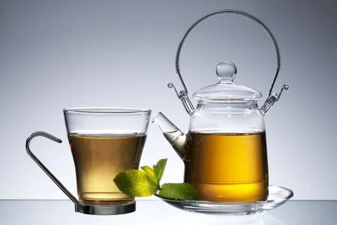 Teapot with tea Stock Photos