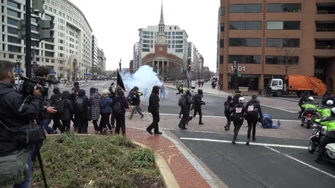 Tear gas and Chaos Downtown Stock Footage