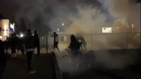 Tear gas and flash bangs on the protest in Portland, Oregon Stock Footage 170338484