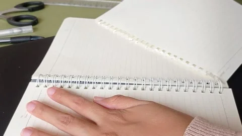 Tear off a paper on a diary book Stock Footage 150523503