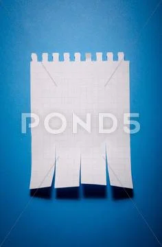 Tear off paper notice on the wall Stock Photos