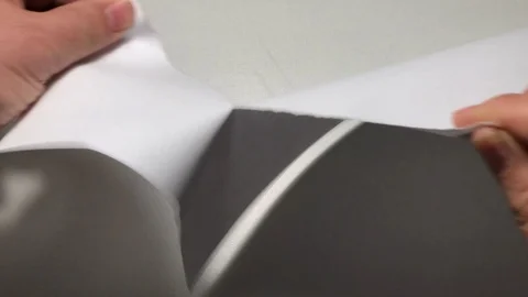 Tear off sheet of paper Stock Footage 122096929