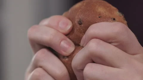 Tearing a bun close-up Stock Footage 87988025