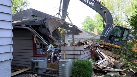 Tearing down an old house Stock Footage 143202900
