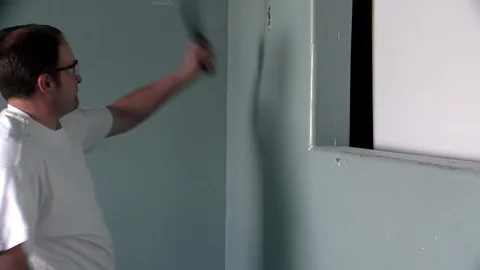 Tearing Down Sheetrock Stock Footage 106668370