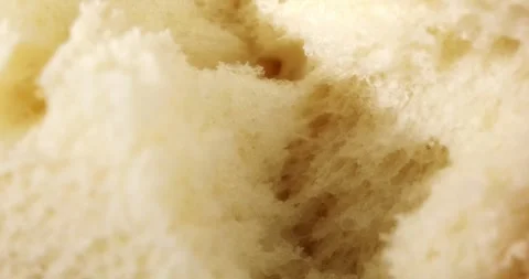Tearing fresh bread. Texture of bread close up. Stock Footage 242446108
